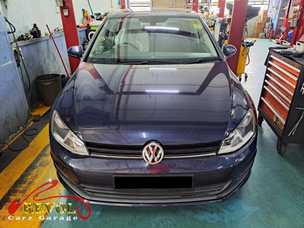 Volkswagen Golf parked at the workshop, in for front brake inspection.