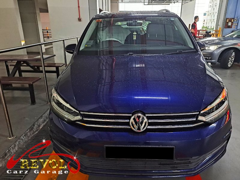 Volkswagen Touran parked at the workshop, in for a coolant leak diagnosis.