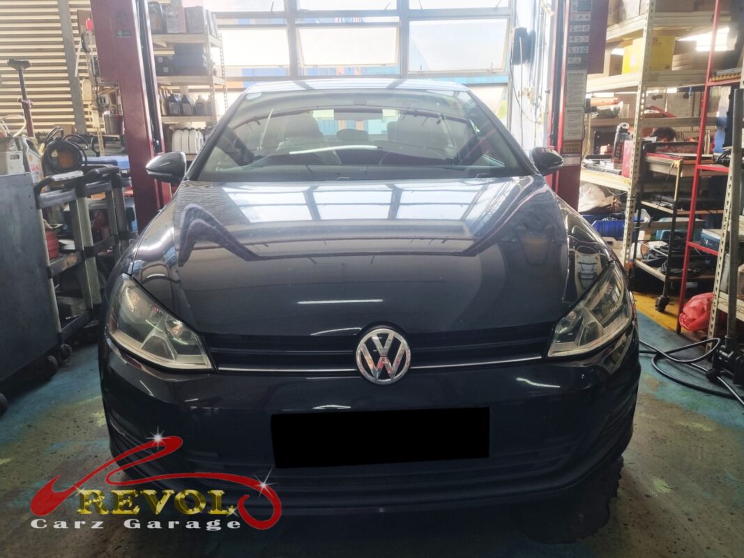 Volkswagen Golf on the workshop lift for full scheduled servicing.
