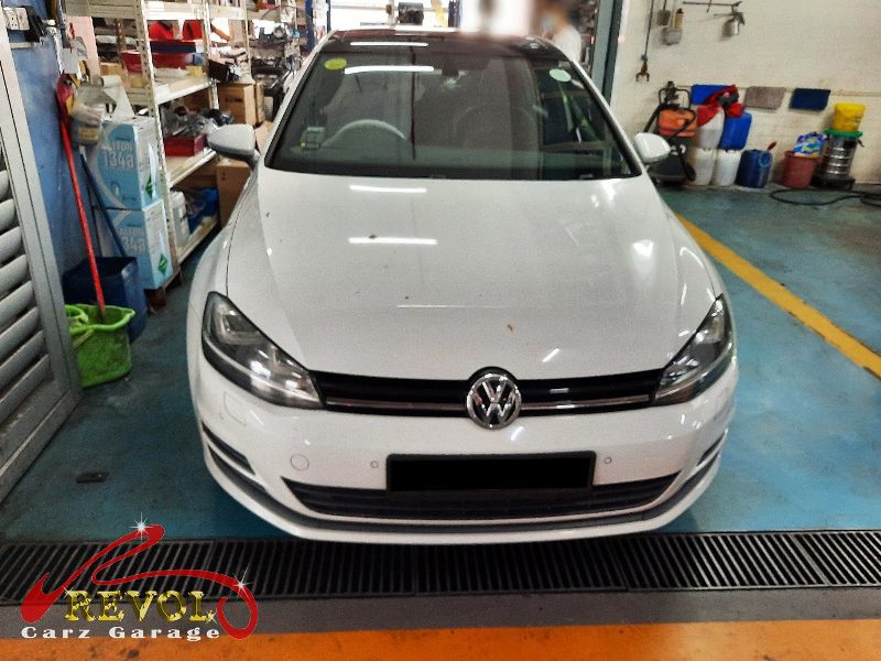 Volkswagen Golf parked at the workshop for regular maintenance.
