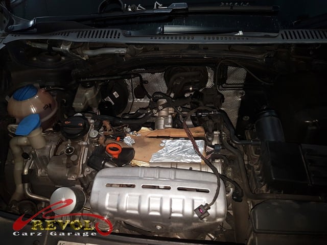 The fuel injector replacement work underway.