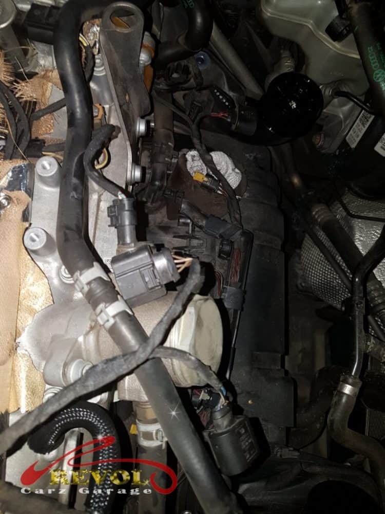 The extensive dismantling needed to reach the fuel injectors.