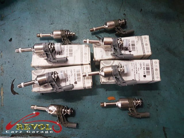 New genuine VW-spec fuel injectors awaiting replacement.