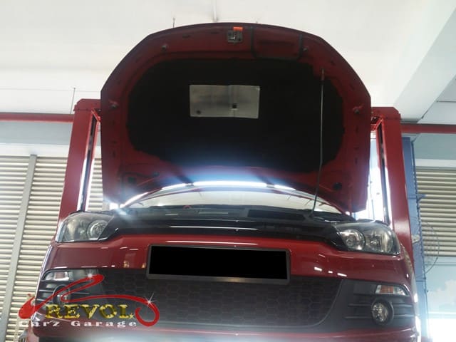 The Volkswagen Scirocco lifted for an overall check before the mechatronics work.