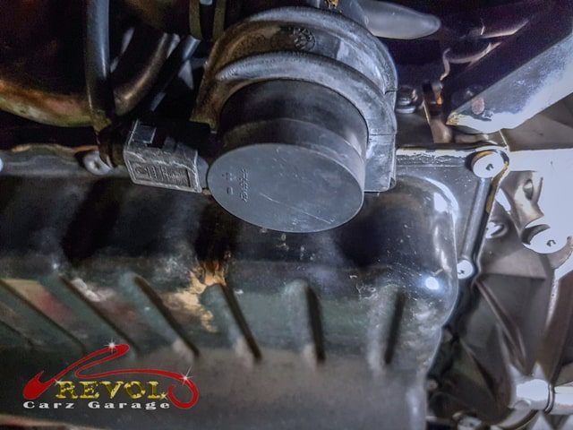 The Volkswagen Passat cooling system pressure-tested, the coolant pump found leaking.