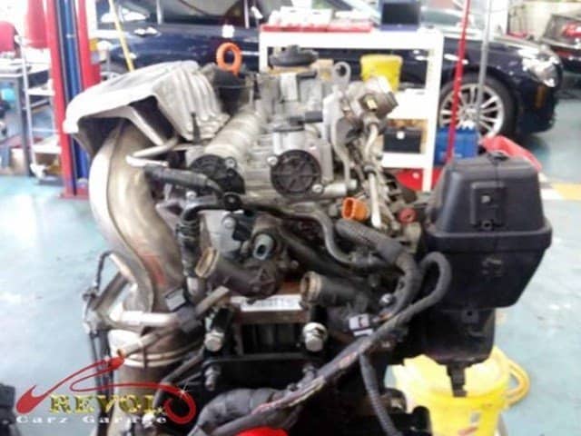 The extensive work of overhauling the engine underway.