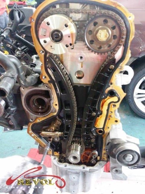 The engine stripped to its components for cleaning and measuring.