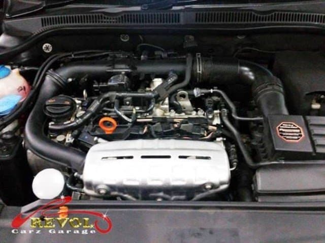 The rebuilt engine refitted to the car and the timing set.