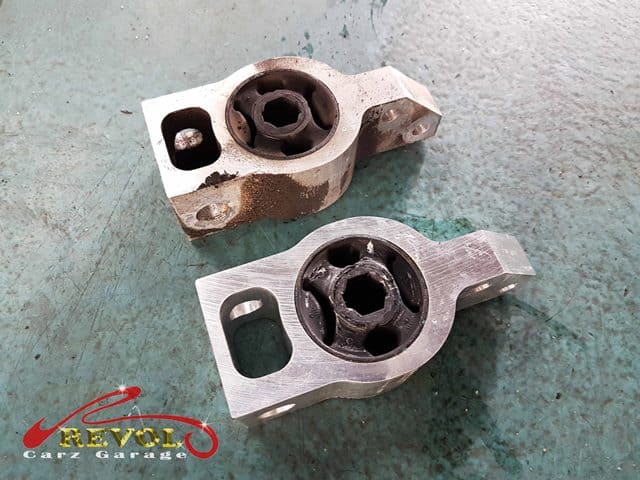 The worn control arm bush found as the noisy culprit.