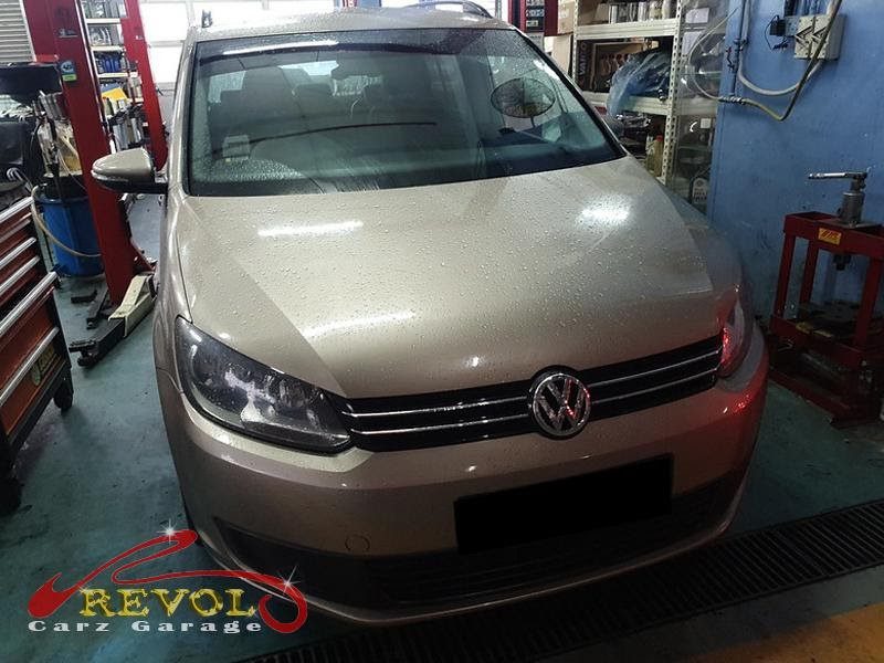 Volkswagen Touran parked at the workshop, in for a gear engagement diagnosis.