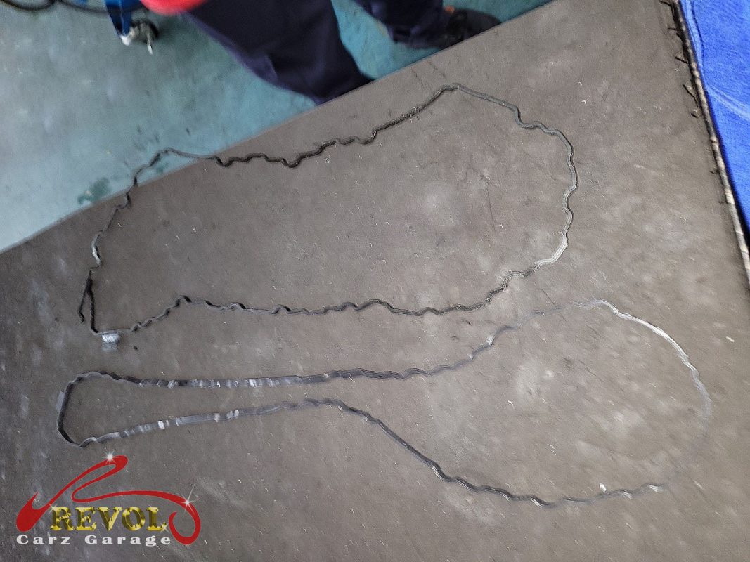 The oil leak traced to the sump gasket.