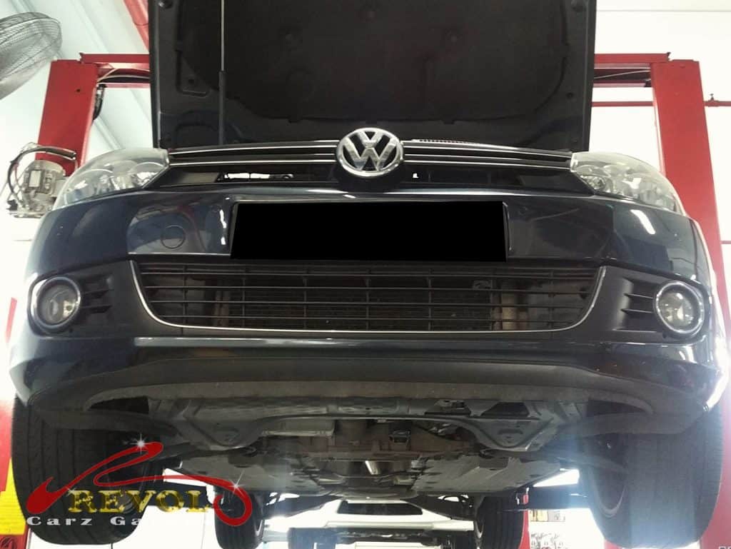 The Golf lifted to access the ABS pump for replacement.