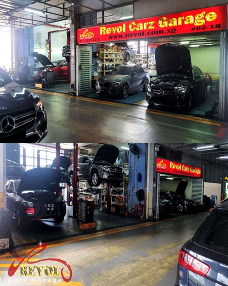 Revol Carz Garage workshop bays with European cars on lifts