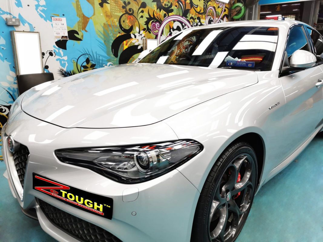 The Alfa Romeo Giulia Veloce from a side angle after the titanium coating.