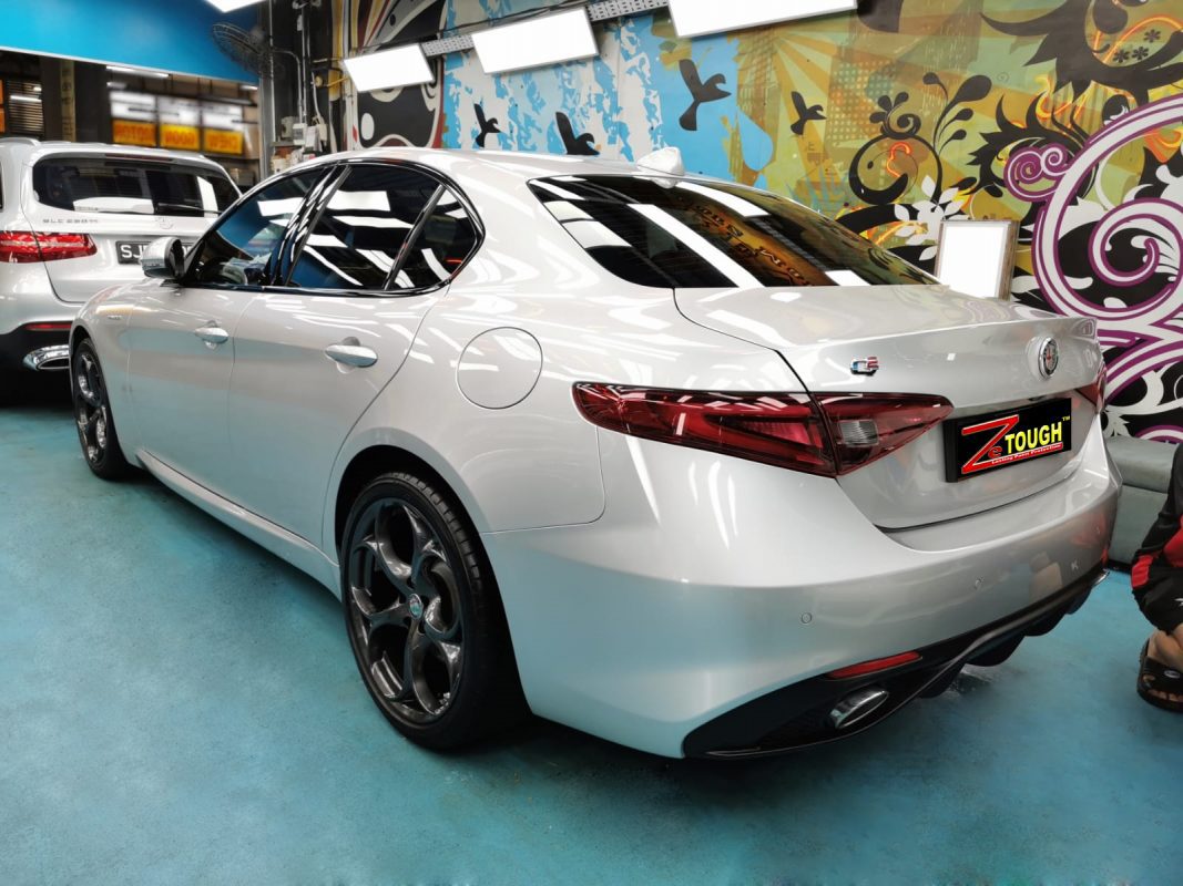 Rear quarter of the Alfa Romeo Giulia Veloce, glossy and protected.