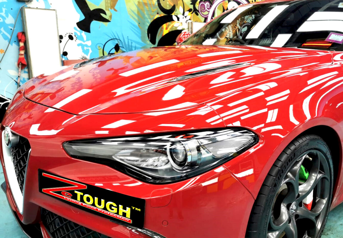 The Alfa Romeo Giulia from a side angle after the ceramic coating.