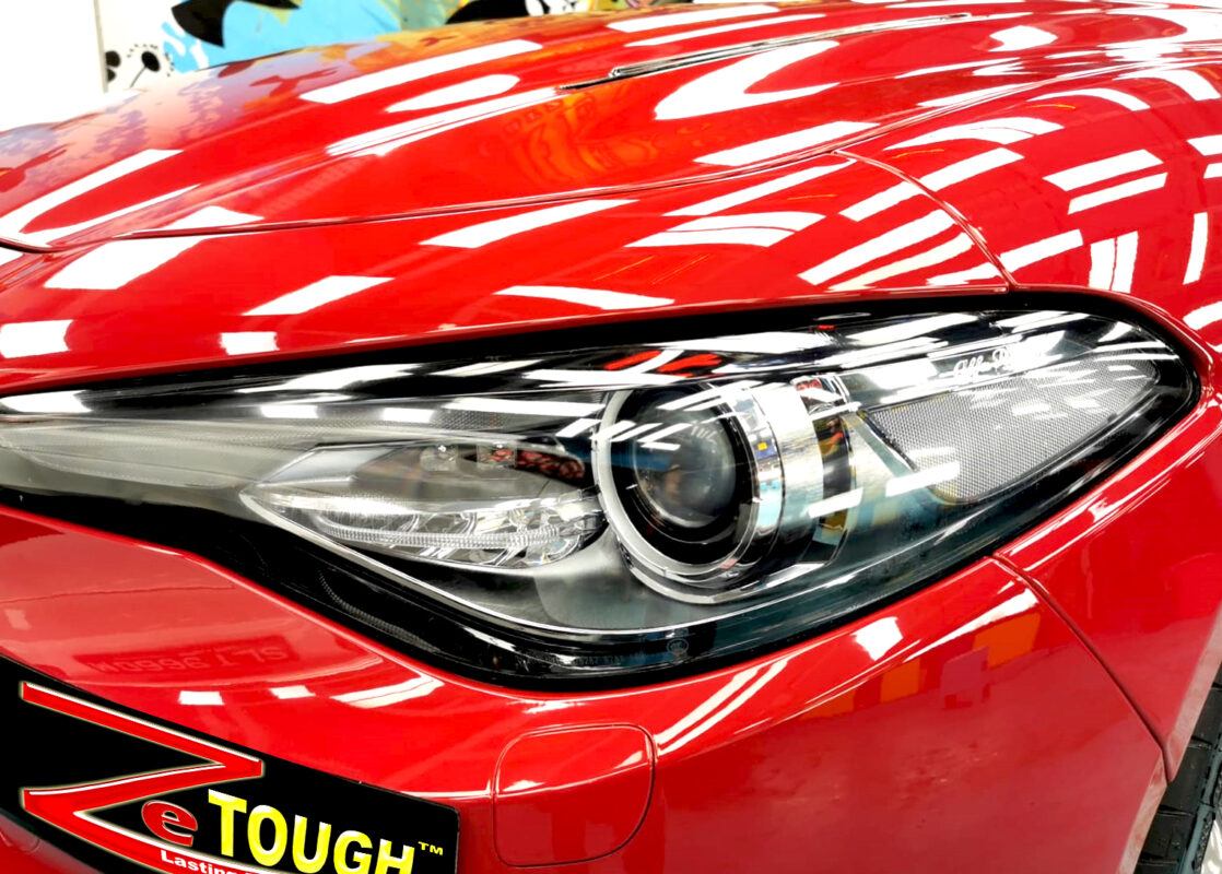 The Giulia's coated paintwork showing clean reflections.