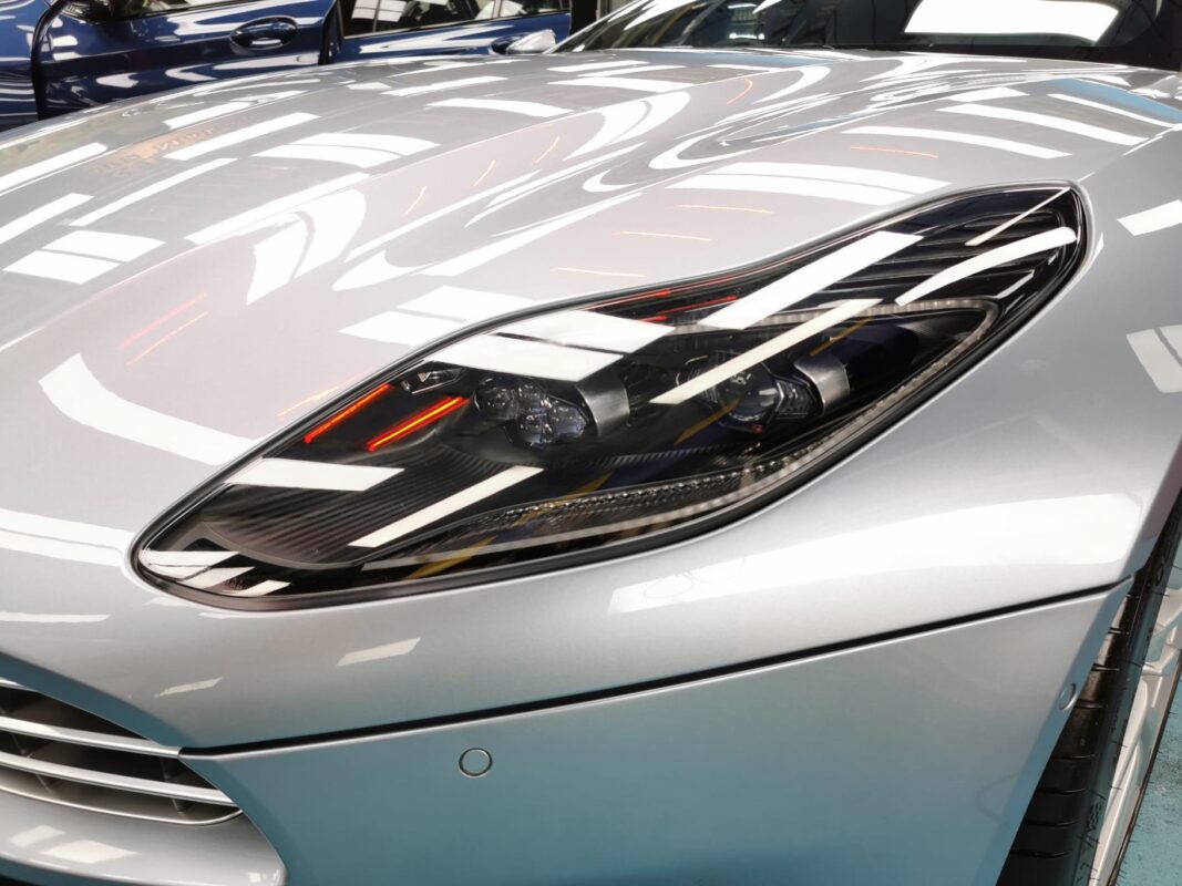 The DB11's coated paintwork showing clean reflections.