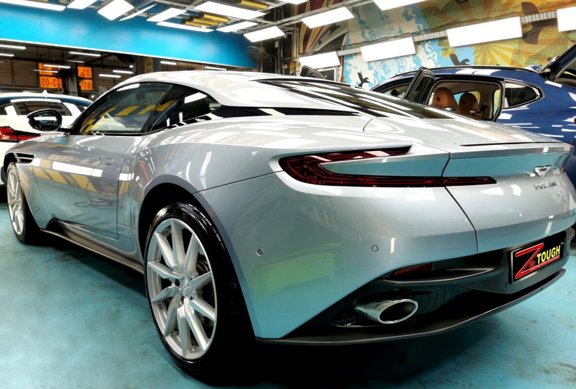 Rear quarter of the Aston Martin DB11, glossy and protected.