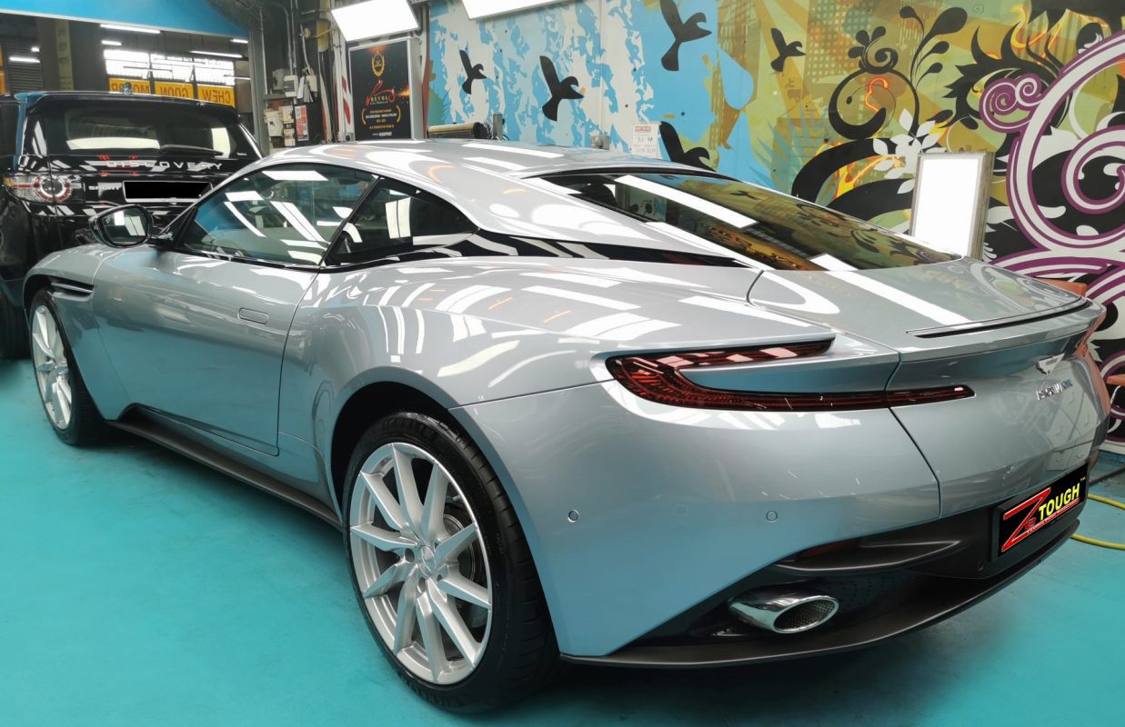 Rear quarter of the Aston Martin DB11 V8, glossy and protected.