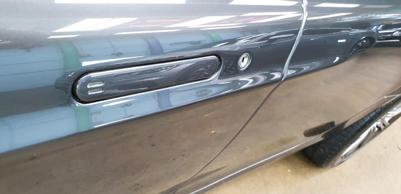 Front three-quarter view of the Aston Martin Rapide after coating.