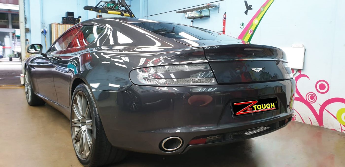 Rear quarter of the Aston Martin Rapide, glossy and protected.