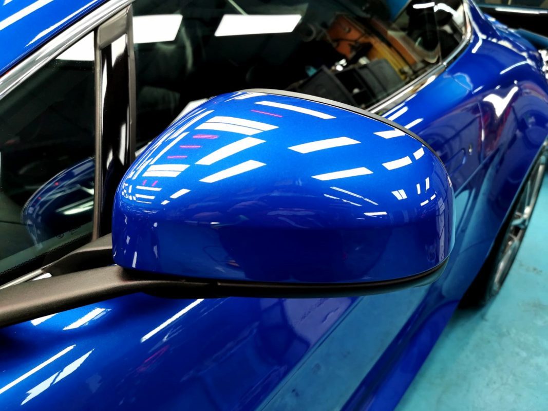 Side panel of the Aston Martin V8 with the titanium finish locked in.