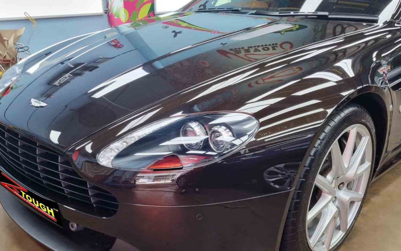 The Aston Martin V8 Vantage from a side angle after the ceramic coating.
