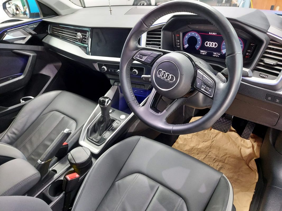 The Audi A1 parked in the workshop, freshly coated.