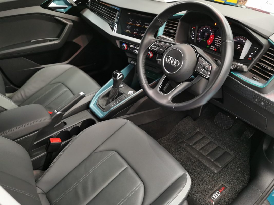 The Audi A1 parked in the workshop, freshly coated.