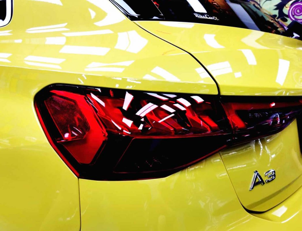 The coated bonnet of the A2 under workshop lighting.