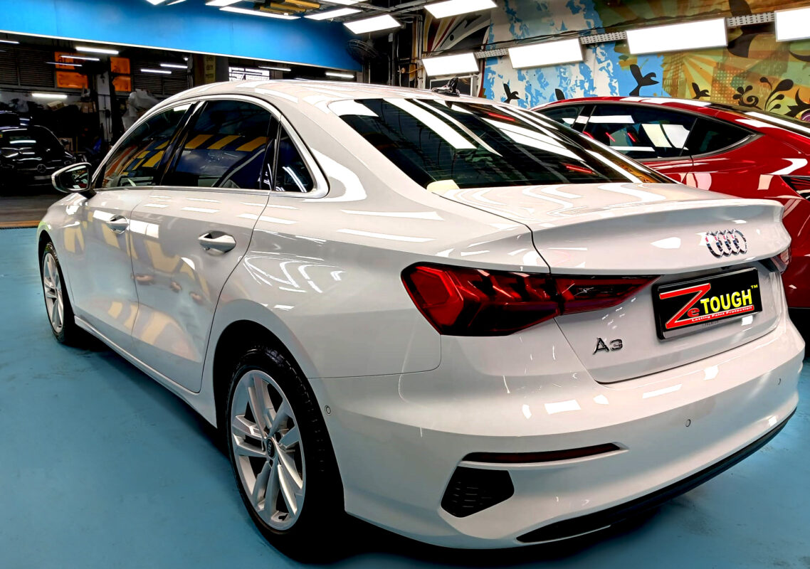 Rear quarter of the Audi A3, glossy and protected.
