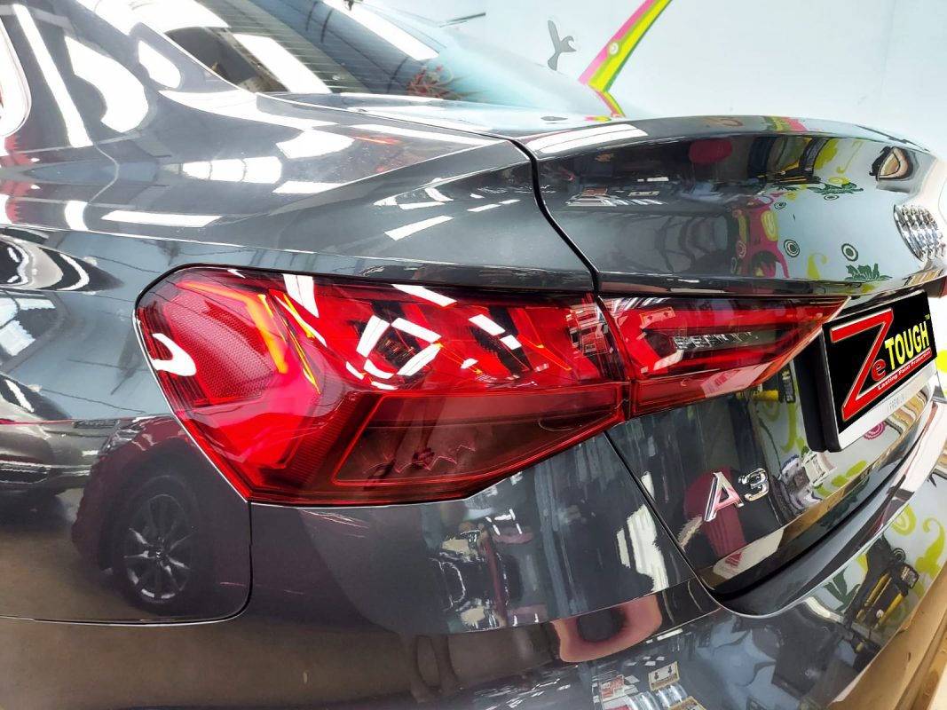 Rear quarter of the Audi A3, glossy and protected.
