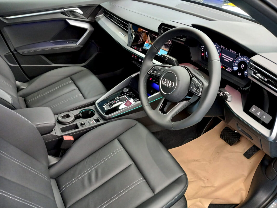The Audi A3 parked in the workshop, freshly coated.