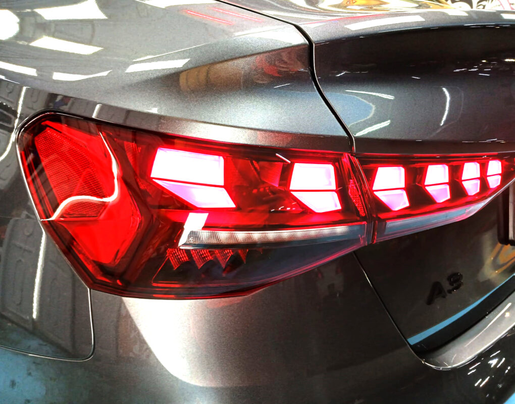 Rear quarter of the Audi A3, glossy and protected.