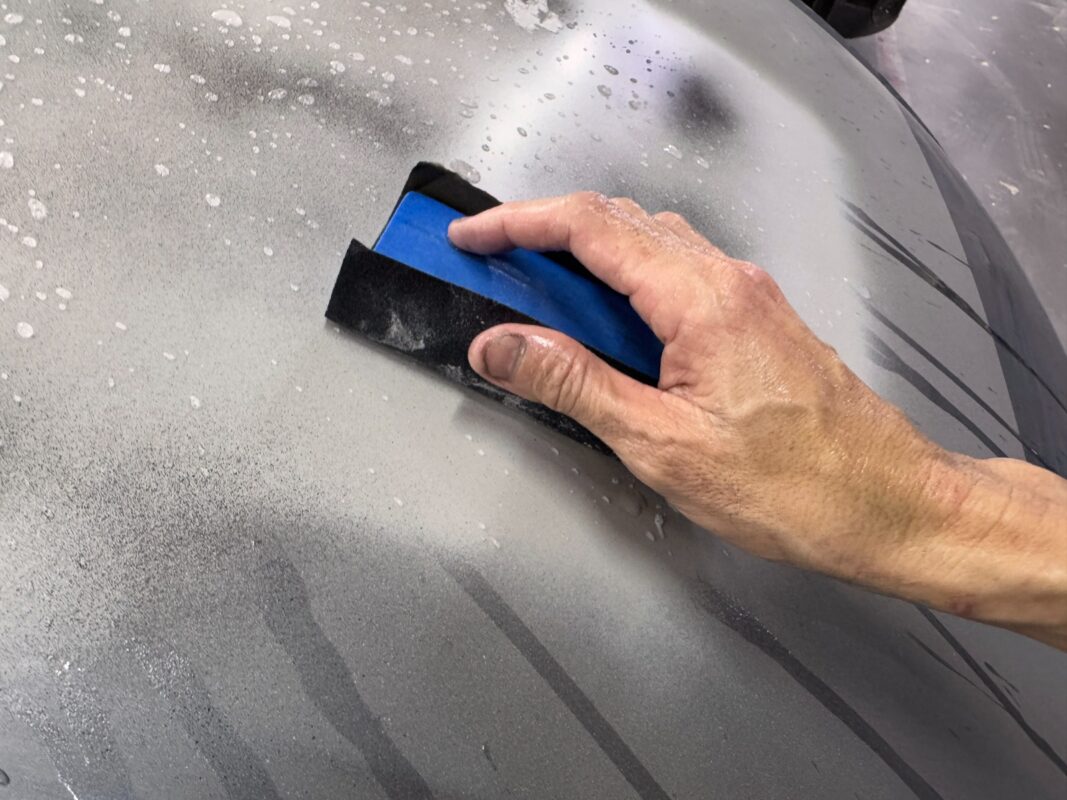 A primer coat applied to the Audi A3 before spraying.