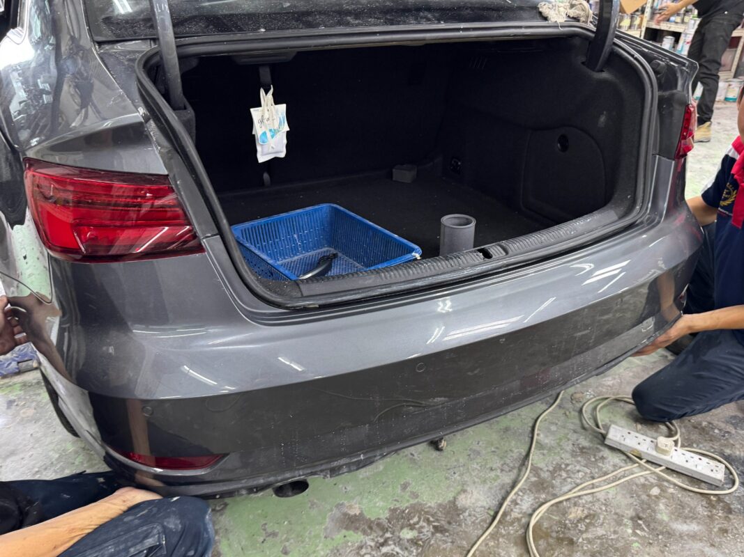 Polishing the new paint on the Audi A3 to bring up the shine.