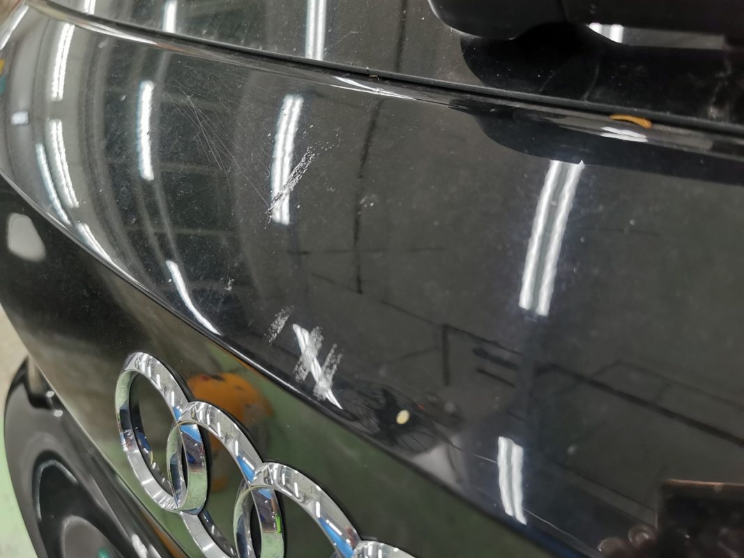 The Audi A3 at intake, showing scratches on the body.