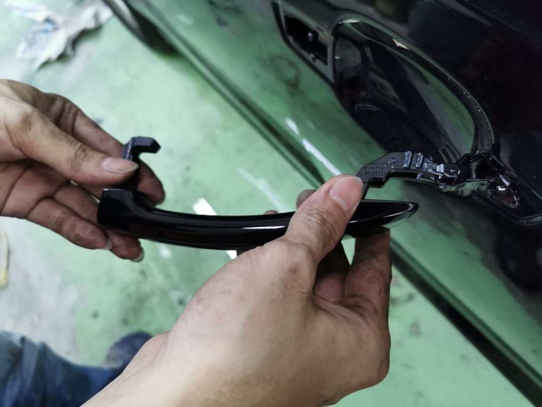 Polishing the new paint on the A3 to bring up the shine.