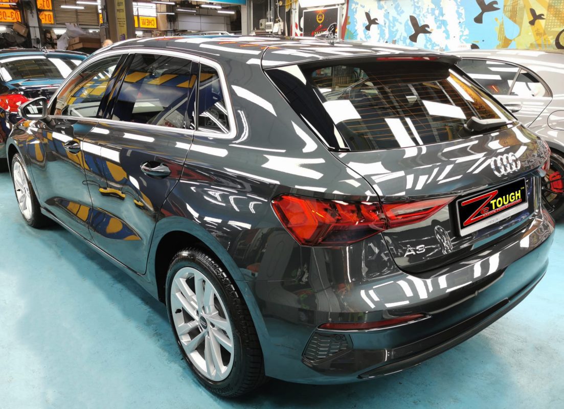 Rear quarter of the Audi A3, glossy and protected.