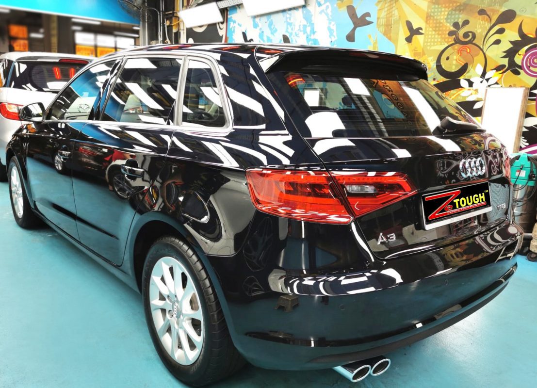 Rear quarter of the Audi A3, glossy and protected.