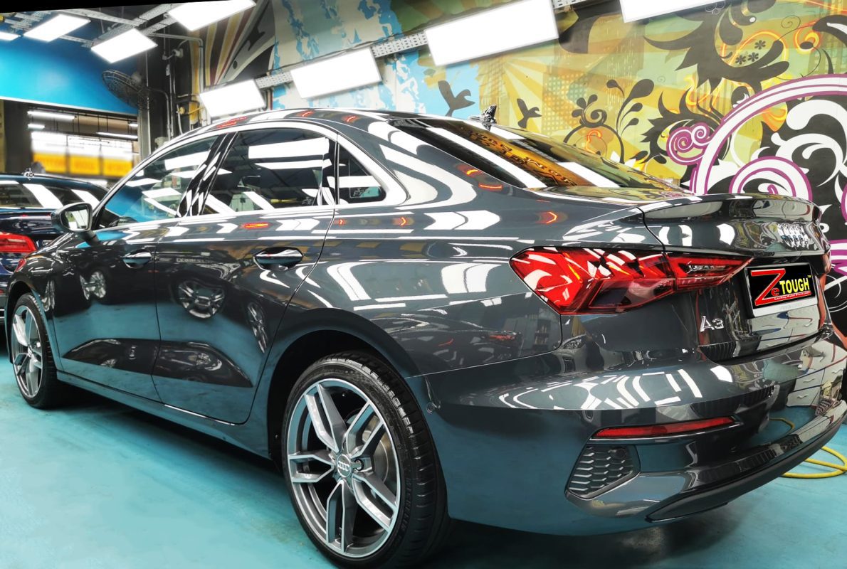 Rear quarter of the Audi A3, glossy and protected.