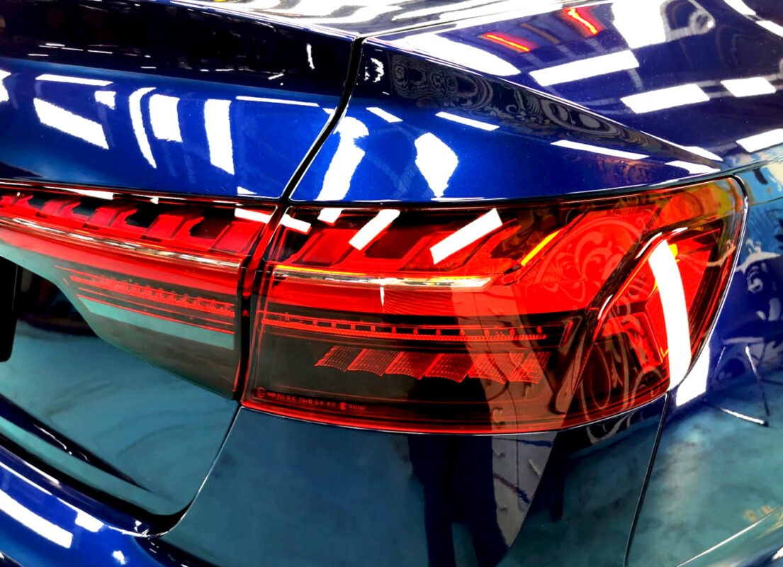 Rear quarter of the Audi A4, glossy and protected.