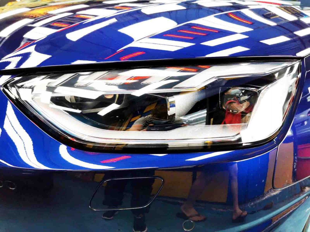 The A4's coated paintwork showing clean reflections.