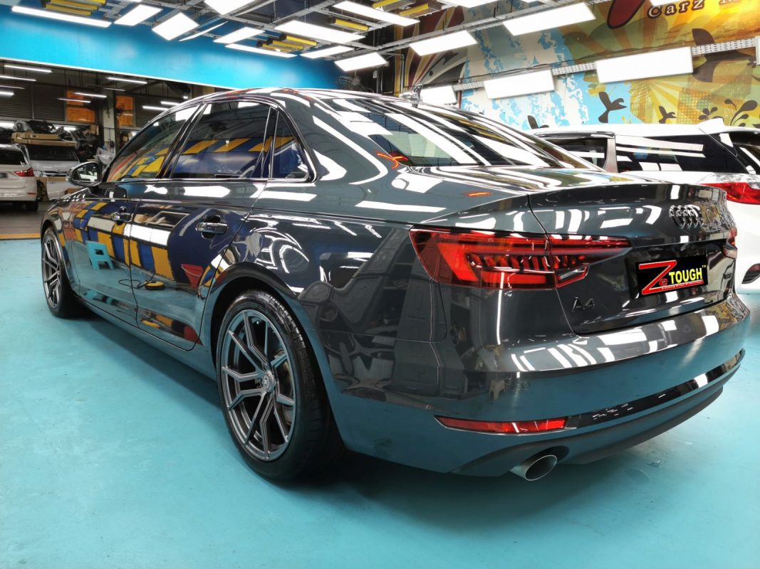 Rear quarter of the Audi A4, glossy and protected.