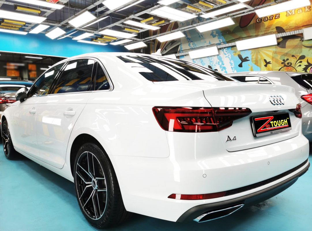 Rear quarter of the Audi A4, glossy and protected.