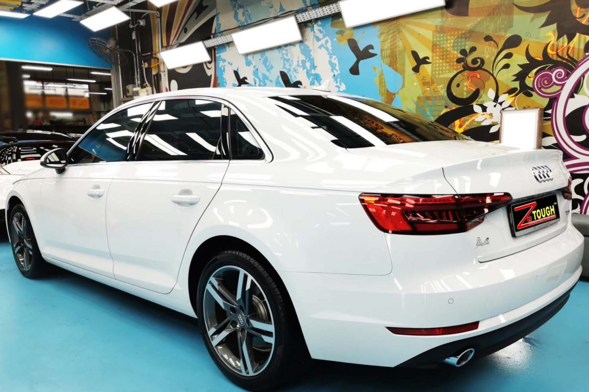 Rear quarter of the Audi A4, glossy and protected.