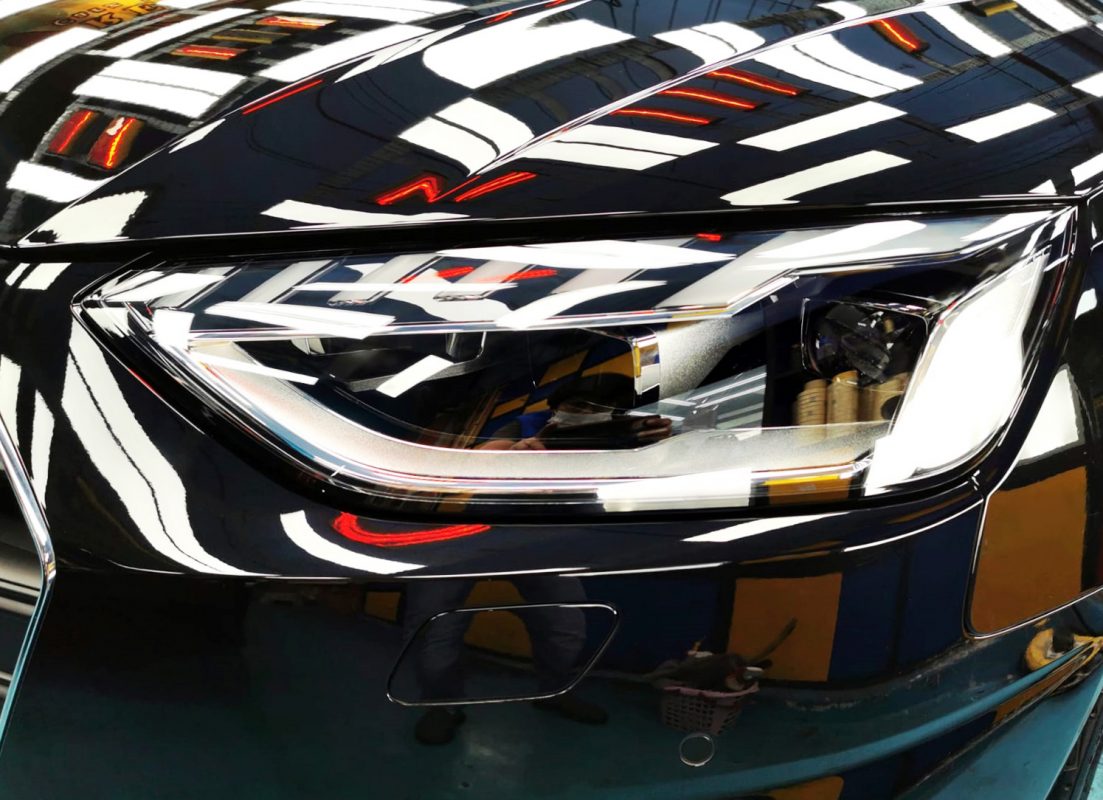 The A4's coated paintwork showing clean reflections.