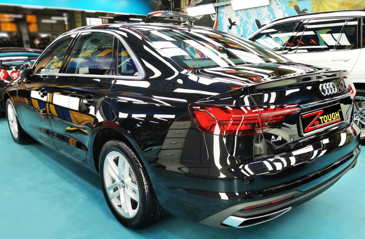 Rear quarter of the Audi A4, glossy and protected.
