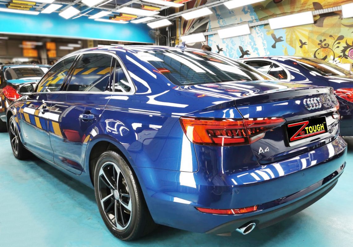 Rear quarter of the Audi A4, glossy and protected.